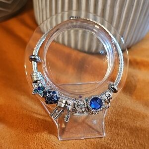 Elegant Silver Bracelet with Blue Charms